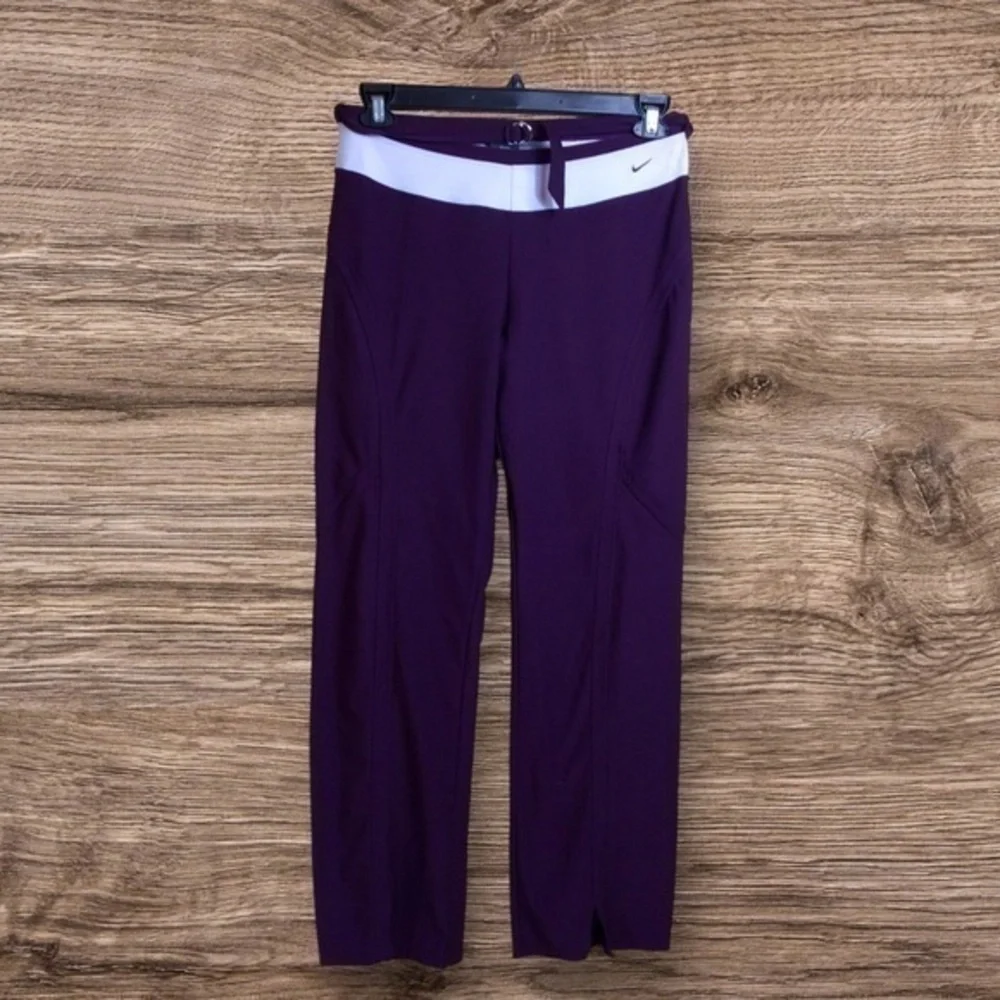 Nike purple dri-fit belted boot cut pants. Medium